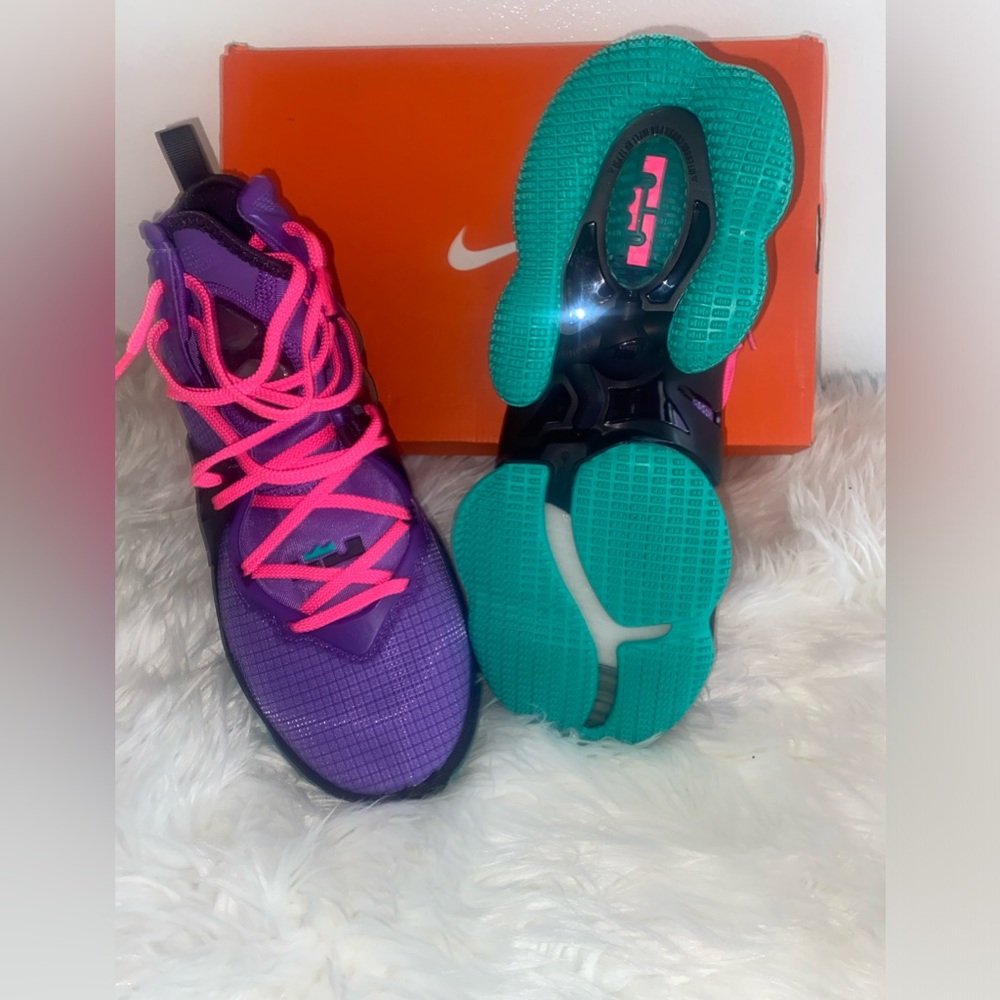 The NIKE LeBron 19 "DJ Bron" Wild Berry/Pink/Cave/ 9.5
Purple men's basketball